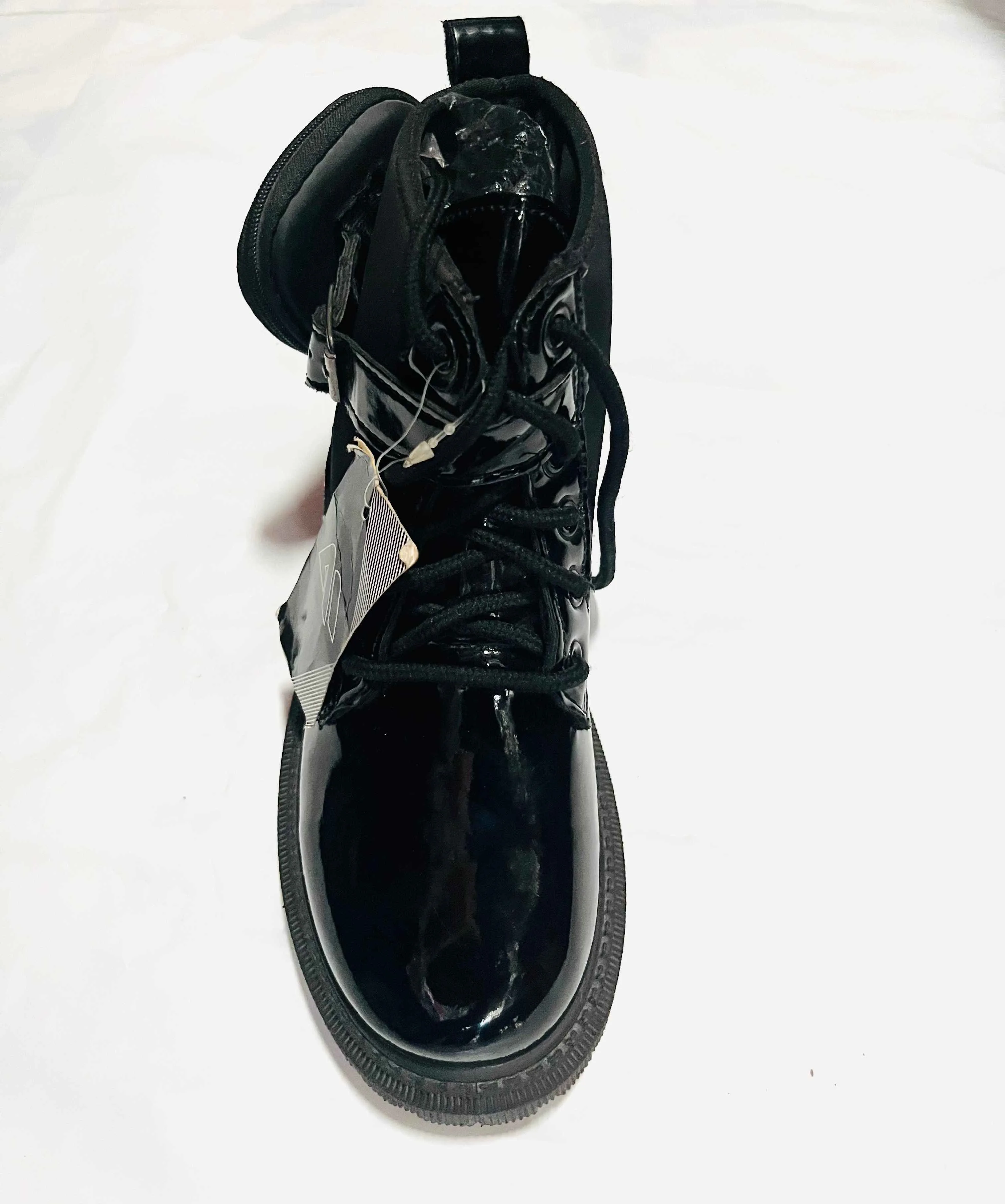 Black lace-up boot with patent leather