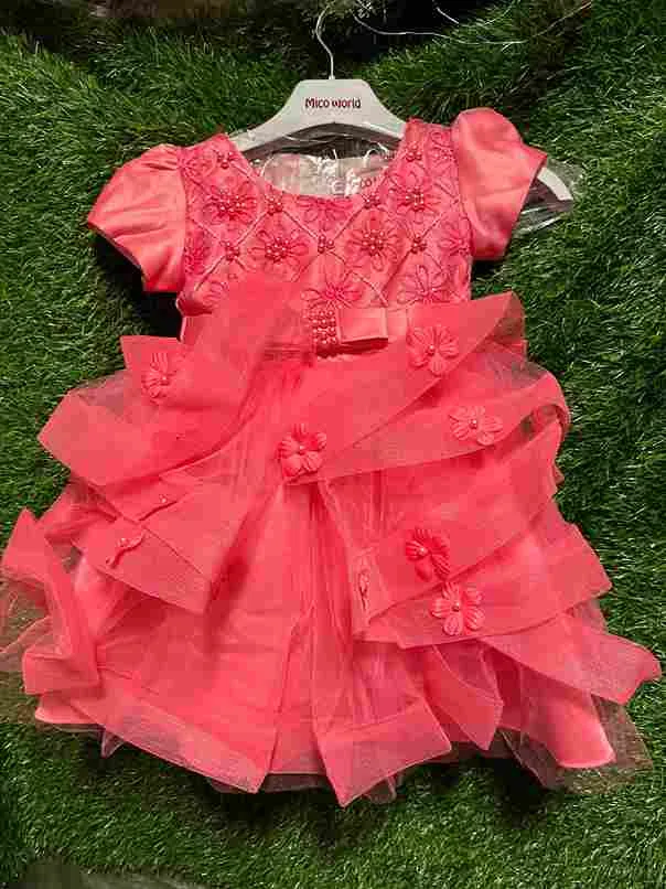 Coral ruffled gown with 3D flower details