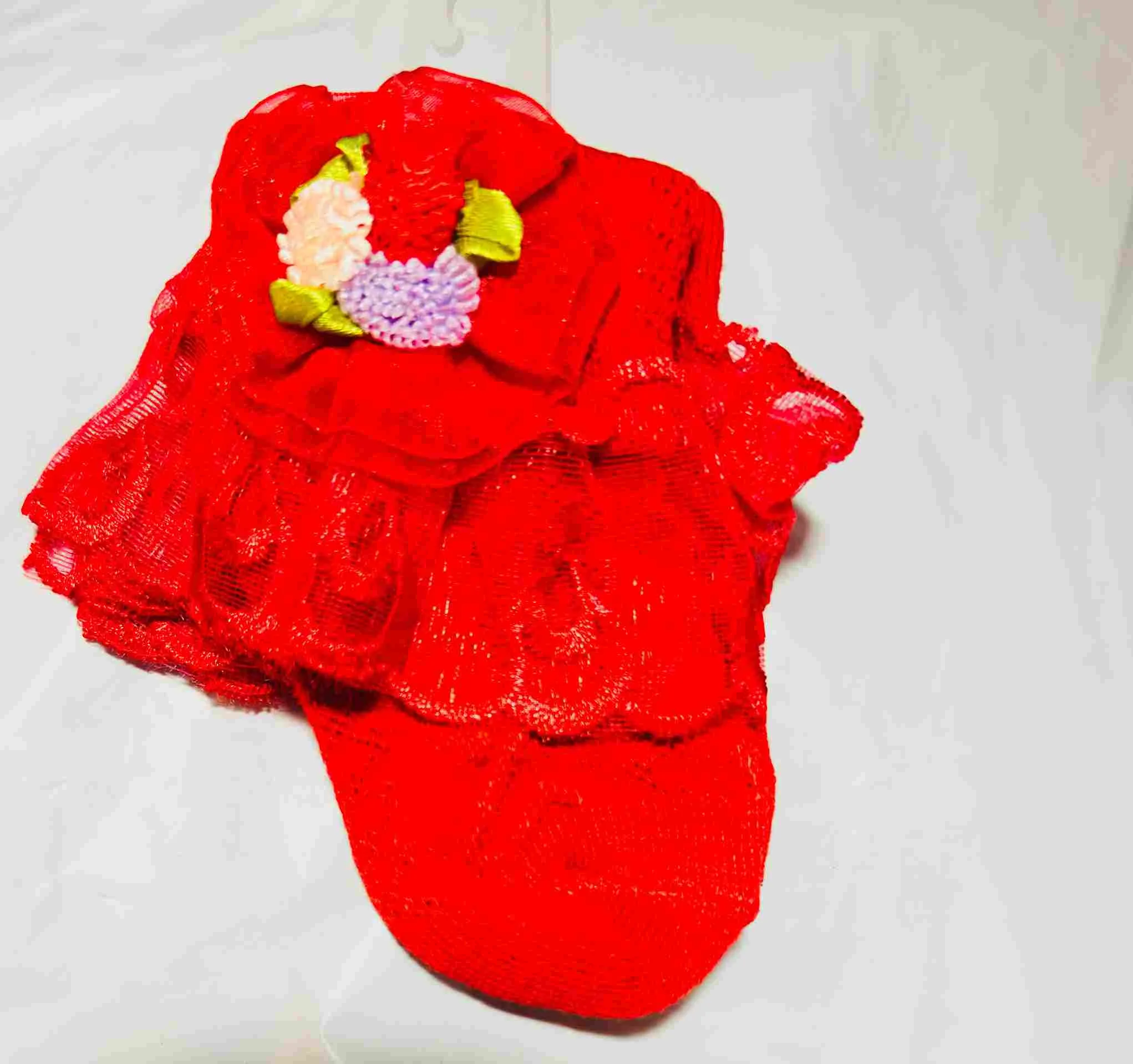 Red lace ruffle sock with flower detail